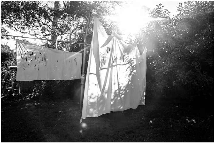 My interest in incorporating fire into LEVO began in a tangle of metaphorical leads. Fire is as profoundly crippling as it is a vital tool. It both serves and stimulates anxiety. With lit incense sticks I laboriously stubbed hot ash into the fiber to make small but conspicuous holes. But in the hopes of increased efficiency, I eventually turned to the miniature butane torch. With the help of my Dad, I applied controlled jets of flame to the fabric at up to 1300 degrees Celsius. I hoped these markings might underpin events and metaphors for my practice-led research on anxiety and sanative making. Destruction/creation. Balance, restoration. Action, and the ruination of one form for another. 

In the Iliad, an aggrieved and raging Achilles is likened to a fire meeting devastation to anything in its path. But here, on a sunny Australian July, under the auspices of the old gum tree I climbed as a kid, Dad and I worked into the white cotton fabric with careful elemental allowance. It was a pleasant return to place and I turned peacefully to the creative push/pull - what is taken/what is left. This limited combustion of fibers is a part of material learning, an arresting occupancy and a larger material and metaphorical study. Where does process start? Why is the elected process elevated over other media? When does its use cease? What can it mean?